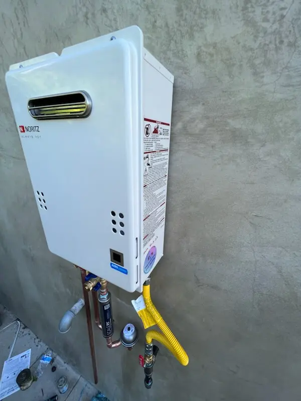 Tankless water heater installation for Village Manor homes